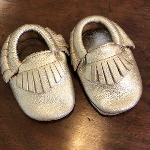 Gold LEATHER moccasins size 6-12 month